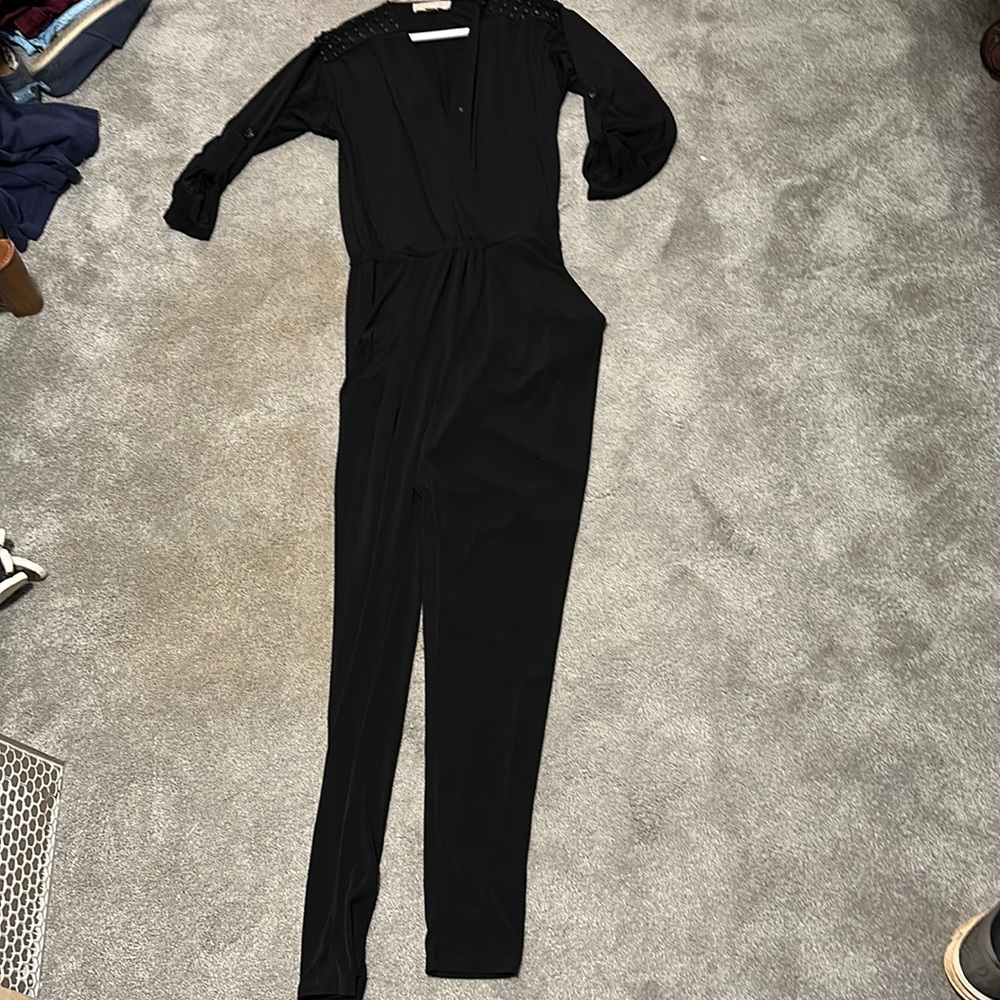 Michael Kors jumpsuit in Black. Nice detailing on shoulders.